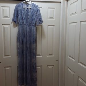 Deep V Neck Blue lace mesh overlay gown.